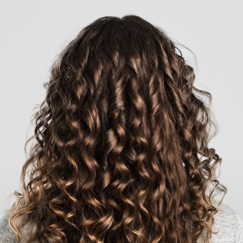 Cheveux permanentés